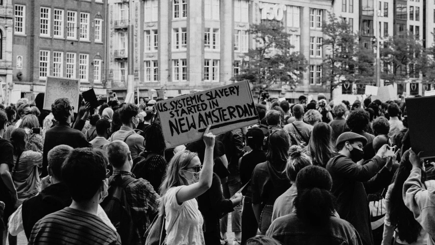 an image of a group of people protesting in a protest