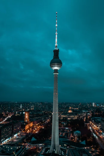 an aerial view of the berlin tv tower at night