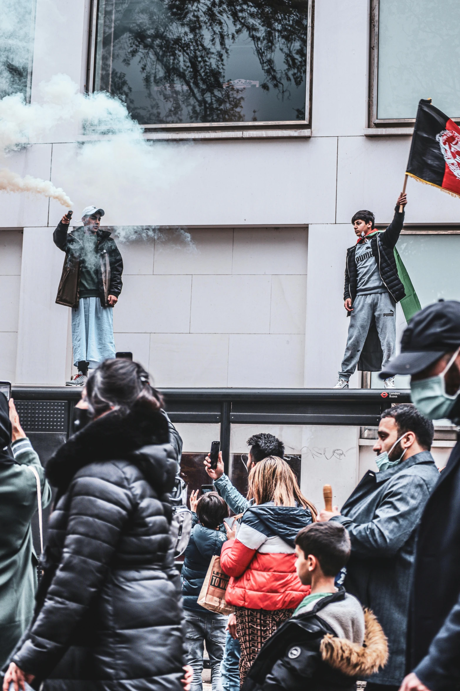 a group of people that are holding flags