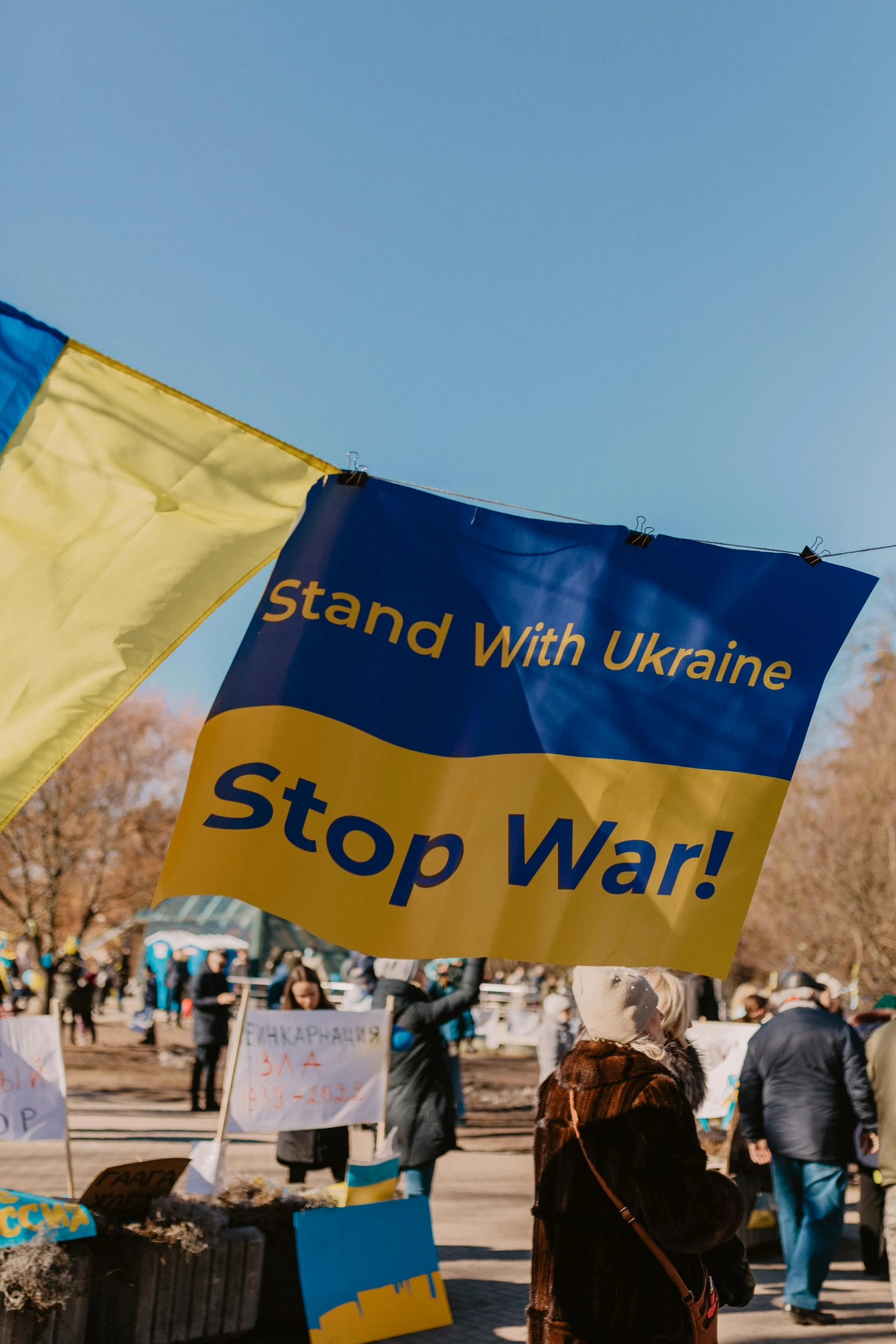 a banner that reads stand with ukraine stop war