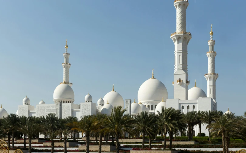 a large white building that has two towers