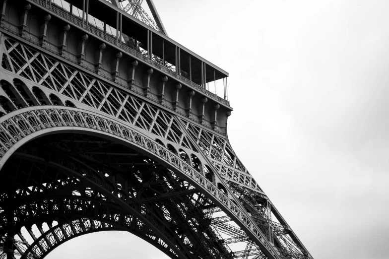 the eiffel tower in black and white is shown