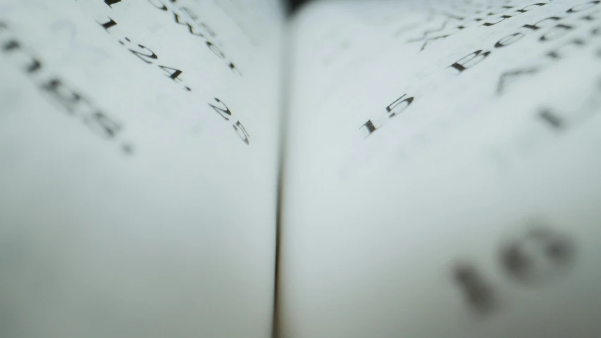 a book opened with a blurry po