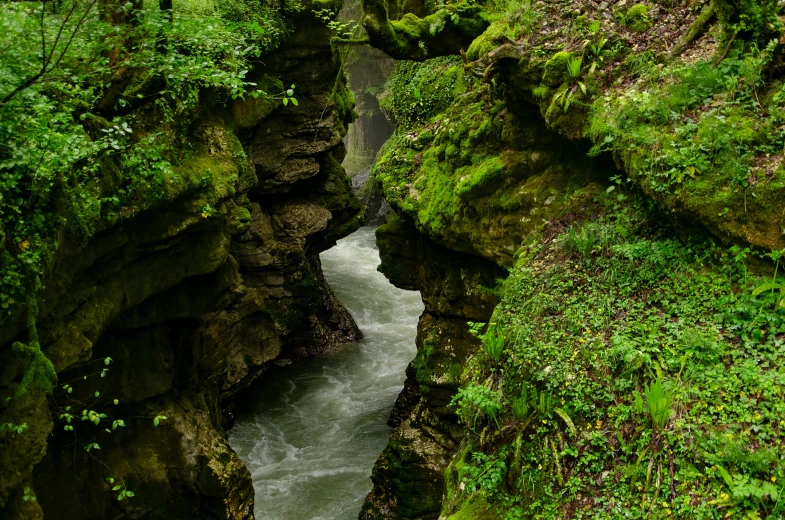 an image of a waterfall going through the rocks