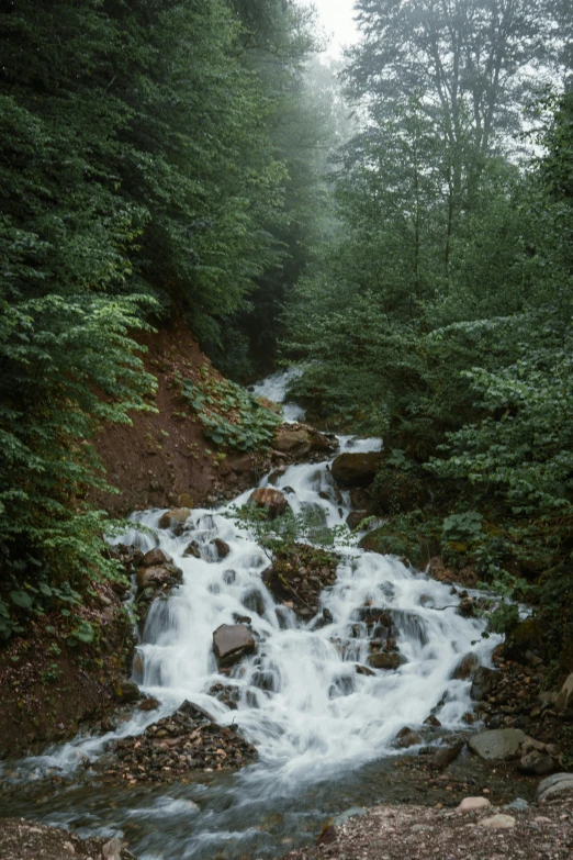 a waterfall that has very little water rushing through it