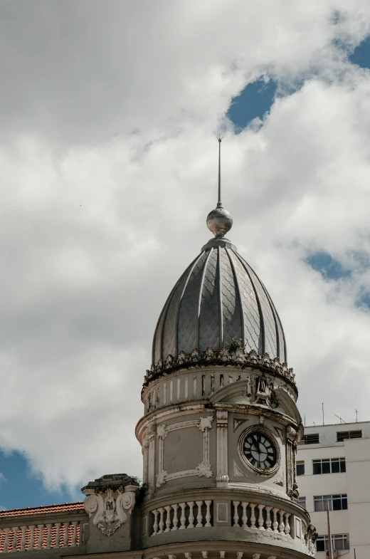 a large building with a clock on the top