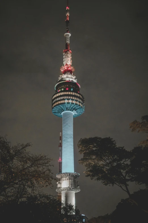 a tall tower in the night time