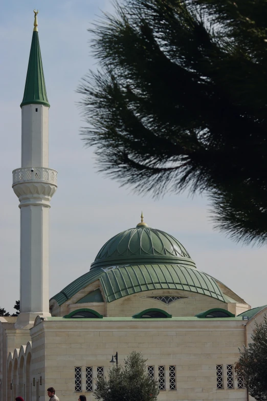 a big green and white dome on top of a building