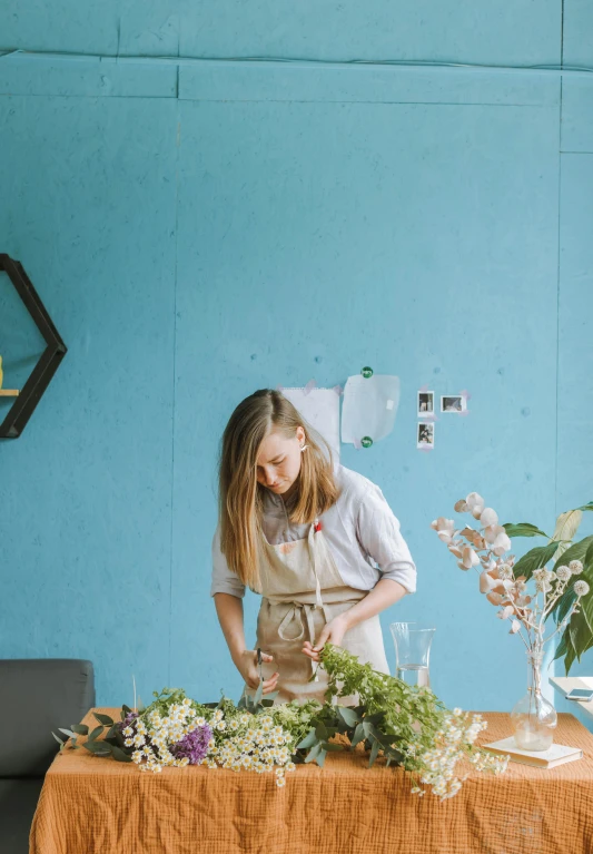 a woman working in a florist shop