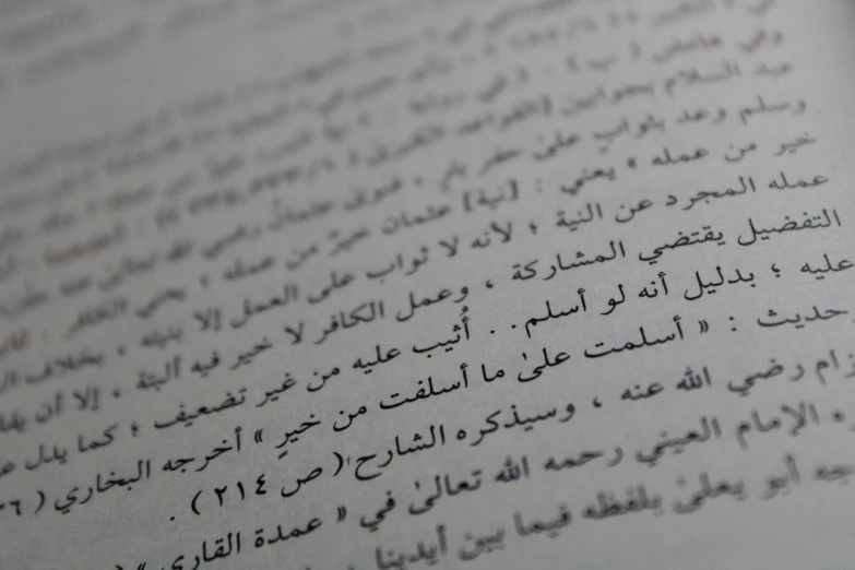 arabic script in a thick, open book