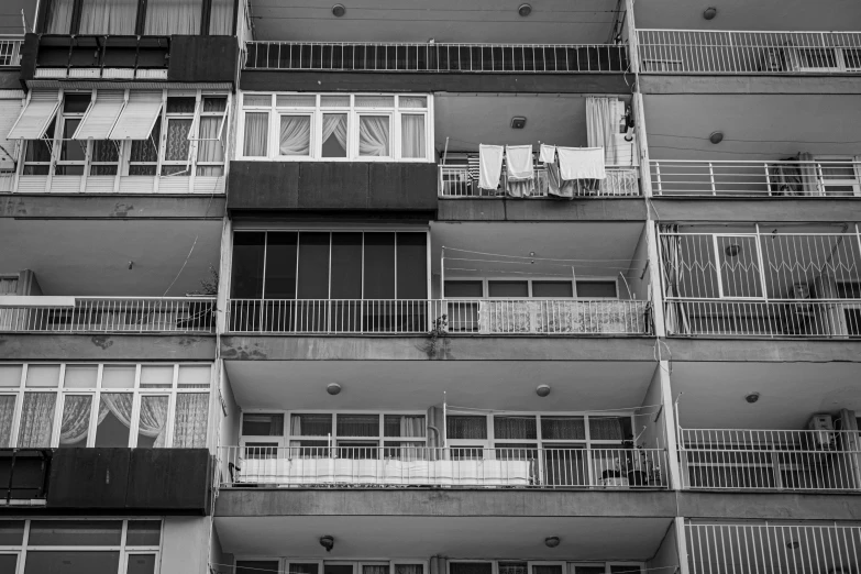 balconies and windows on the side of a building