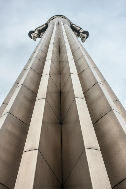 the top of an obelisk against a blue sky