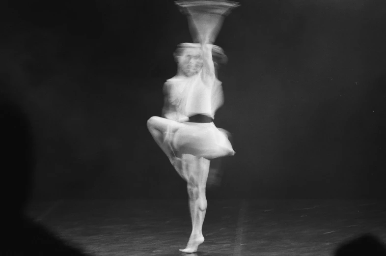 a woman with one leg raised in front of her