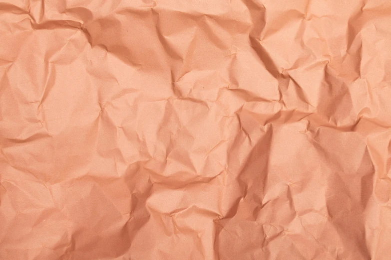 an orange crumpled paper surface is shown with no visible lines