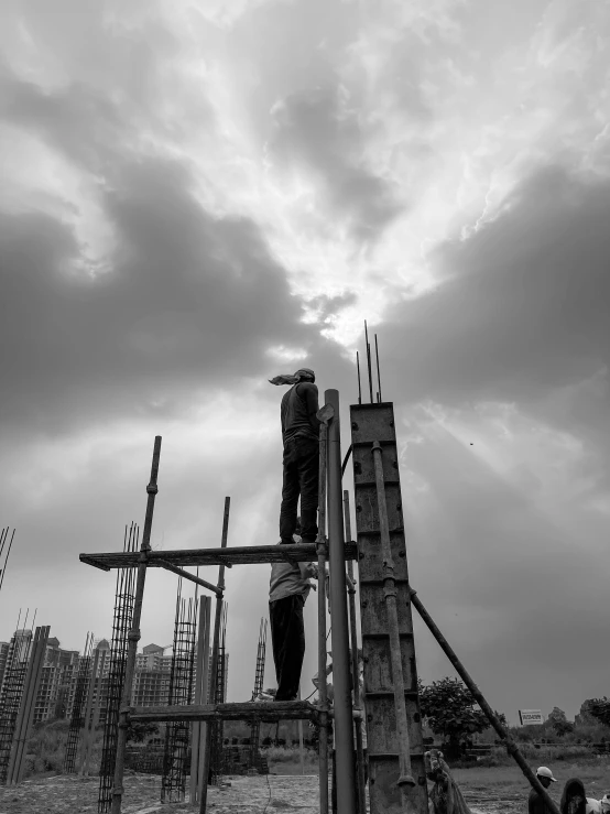 a person is standing on a wooden structure