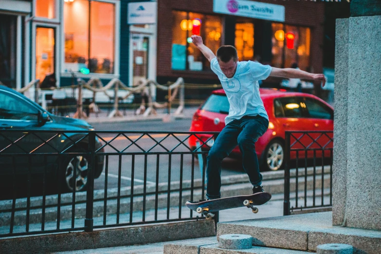 the  is doing a trick on his skateboard