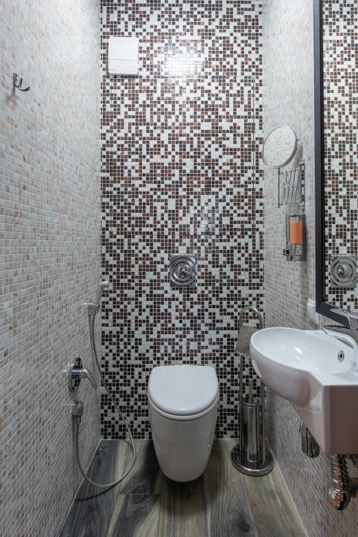 the small bathroom is decorated in colorful tile