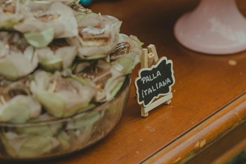 there is food on a table and small pins