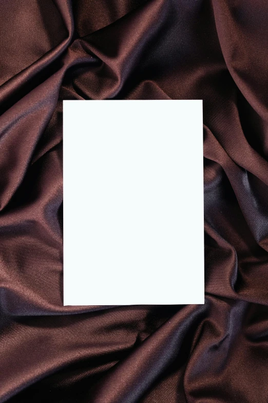 blank card with brown satin material for decoration or backdrop