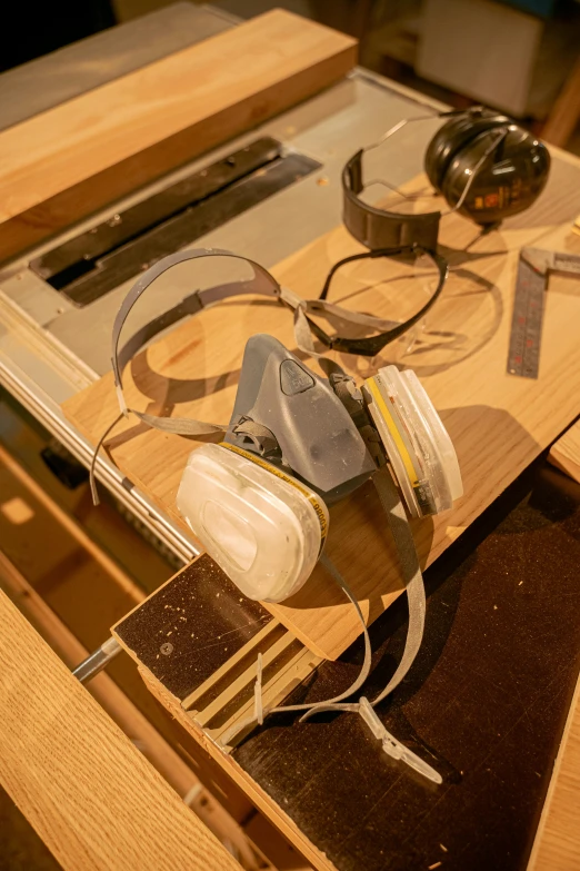 a glass top table with a pair of headphones on it