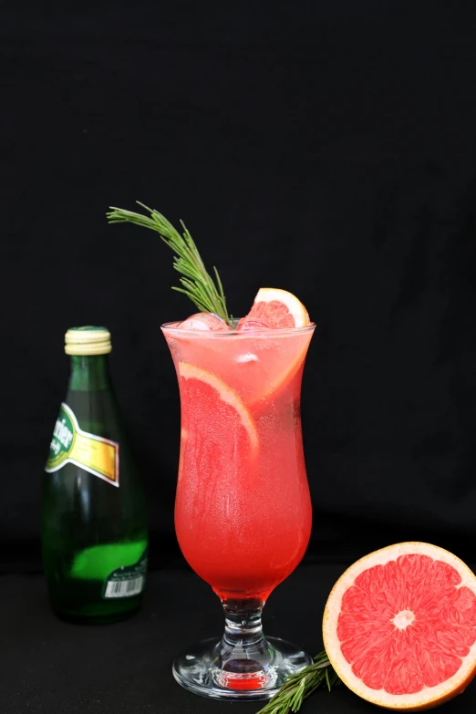 a drink and gfruit with herbs