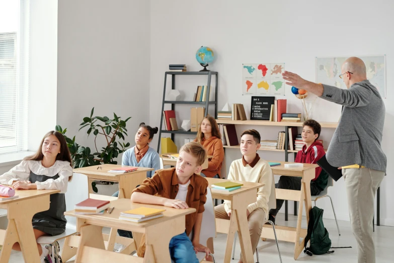 there is an image of a man teaching a class