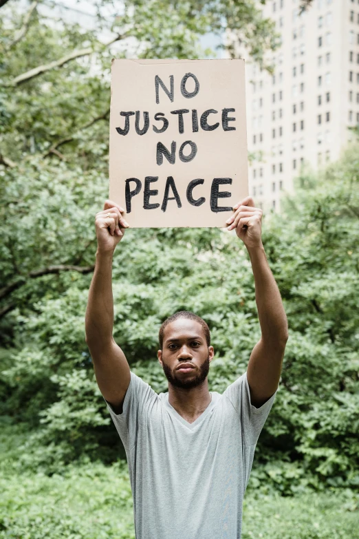 a man is protesting at an occupy demonstration