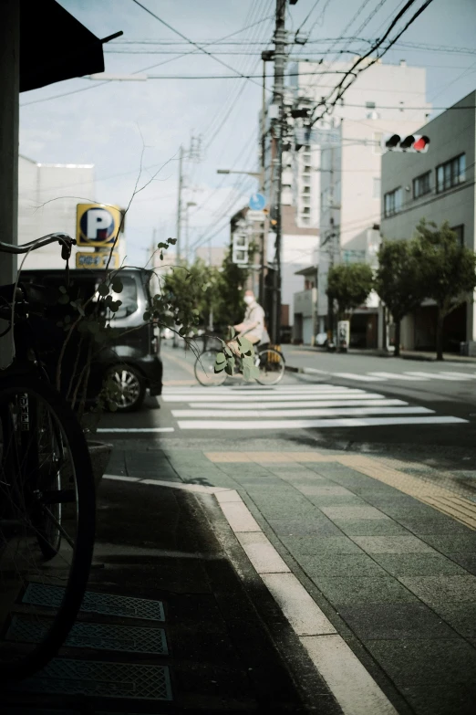 a person riding a bike on a street