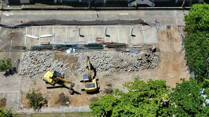 aerial view of graveling and construction equipment from the air