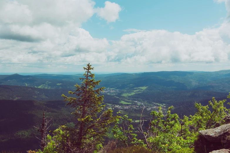 a mountain range overlooks the view of the valley