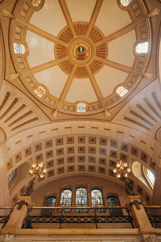 the top view of an ornately designed ceiling in a church