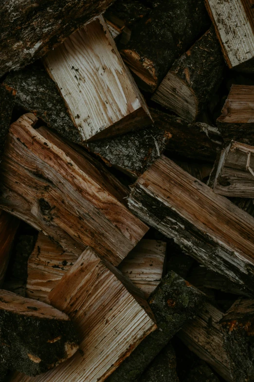 a wooden crate has a knot on top of it