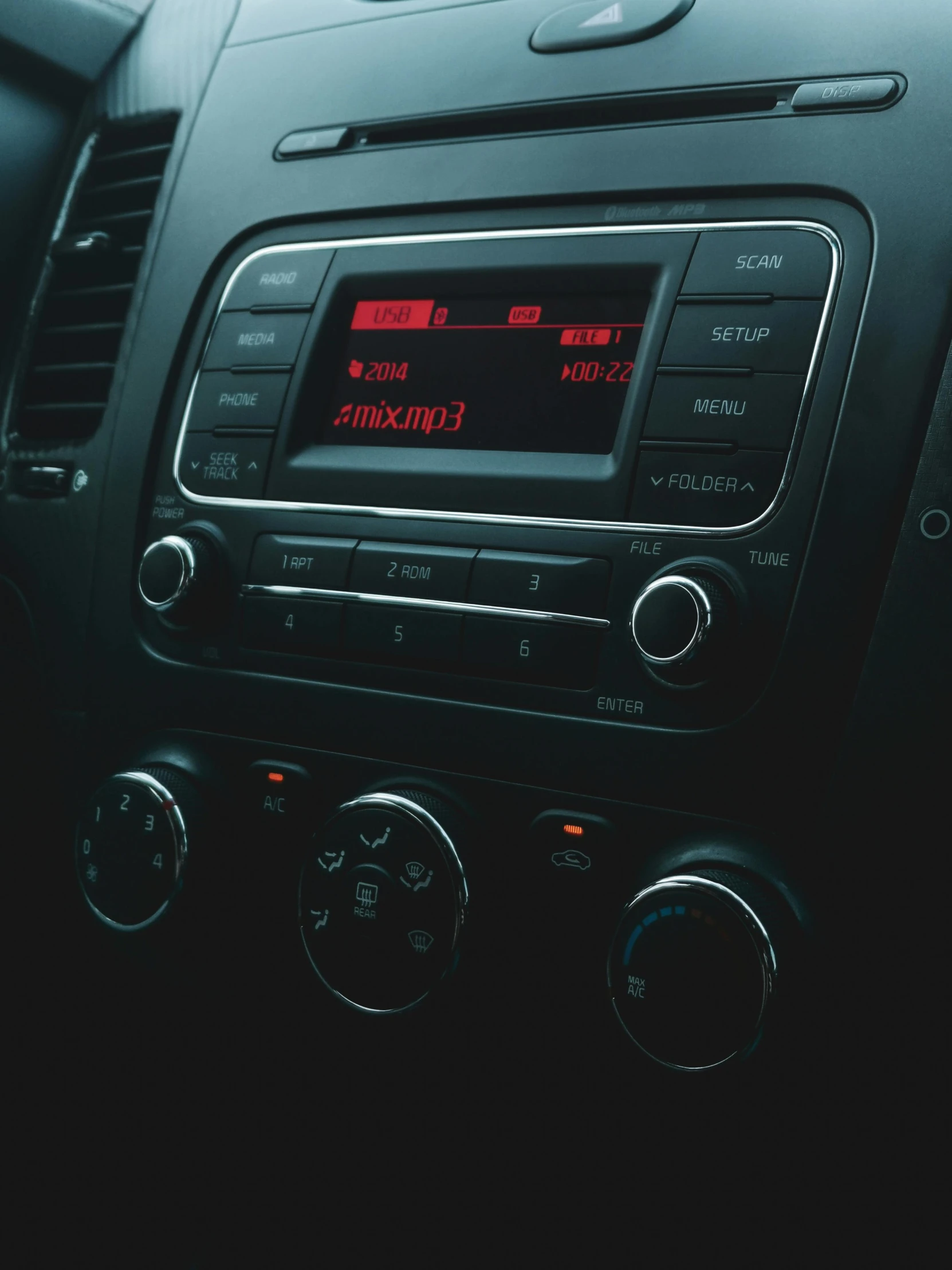 the dashboard of a car with red digital numbers