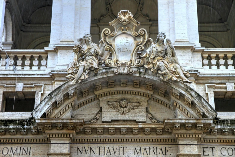 a close up view of a building with architectural carvings