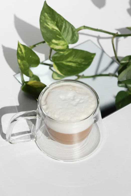 a white drink sits on a saucer