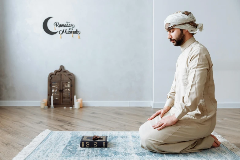 a man sitting on the floor in meditation