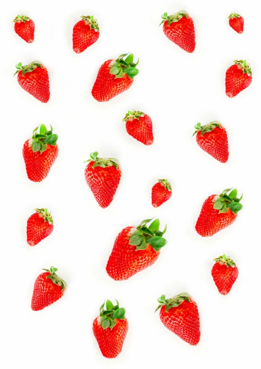 the whole group of strawberrys is arranged in a pattern