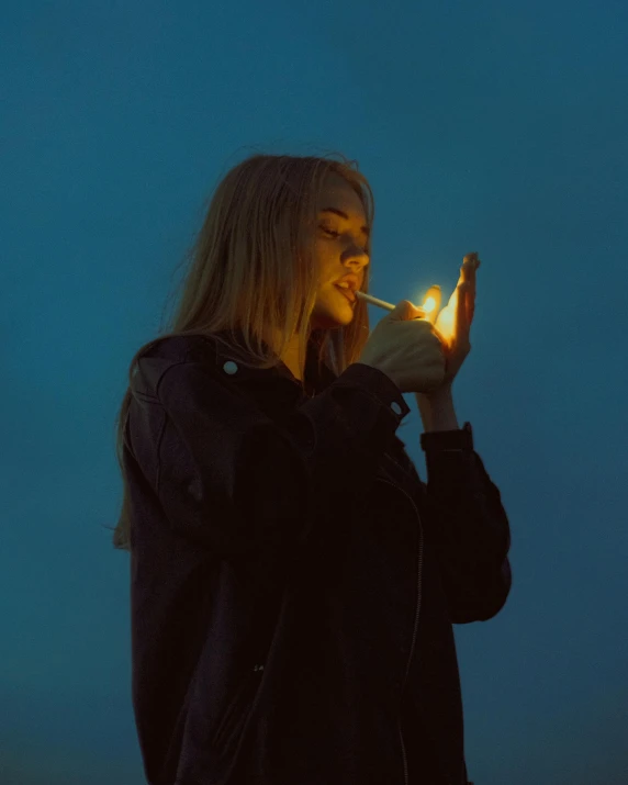 woman smoking a cigarette and looking back