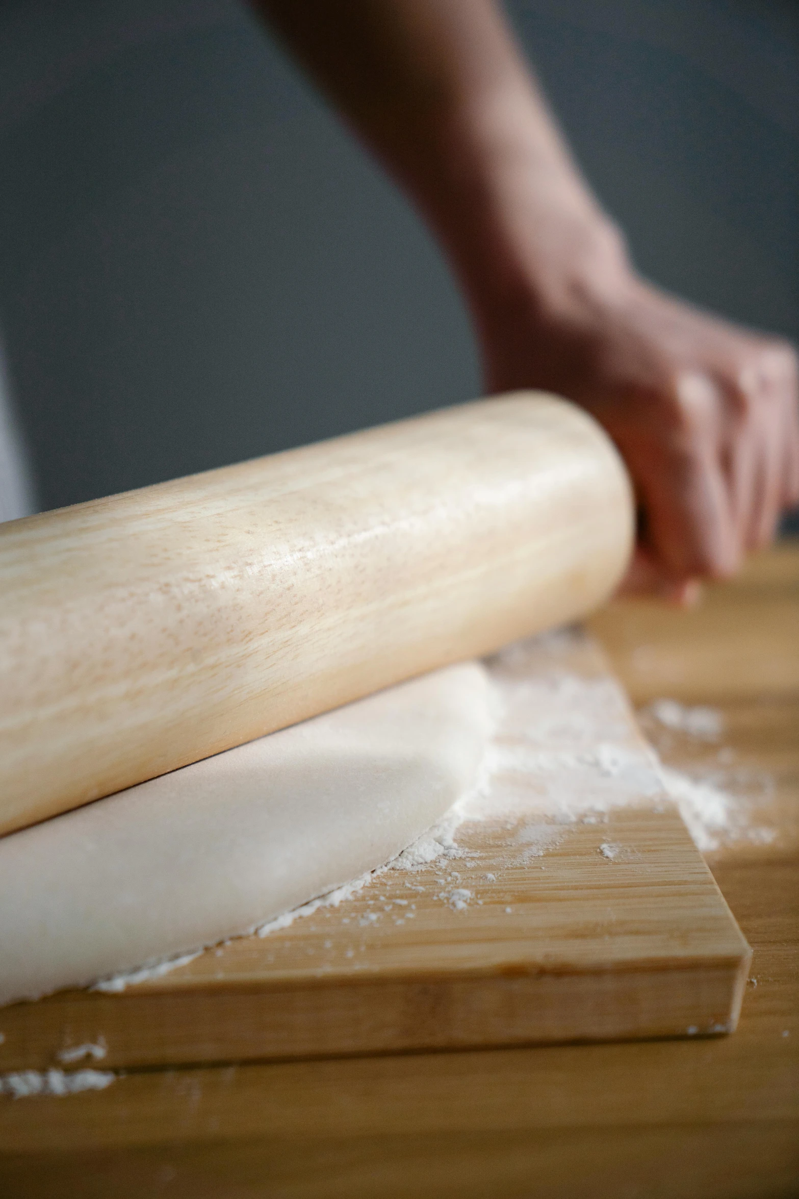 a close up of a person using a baseball bat