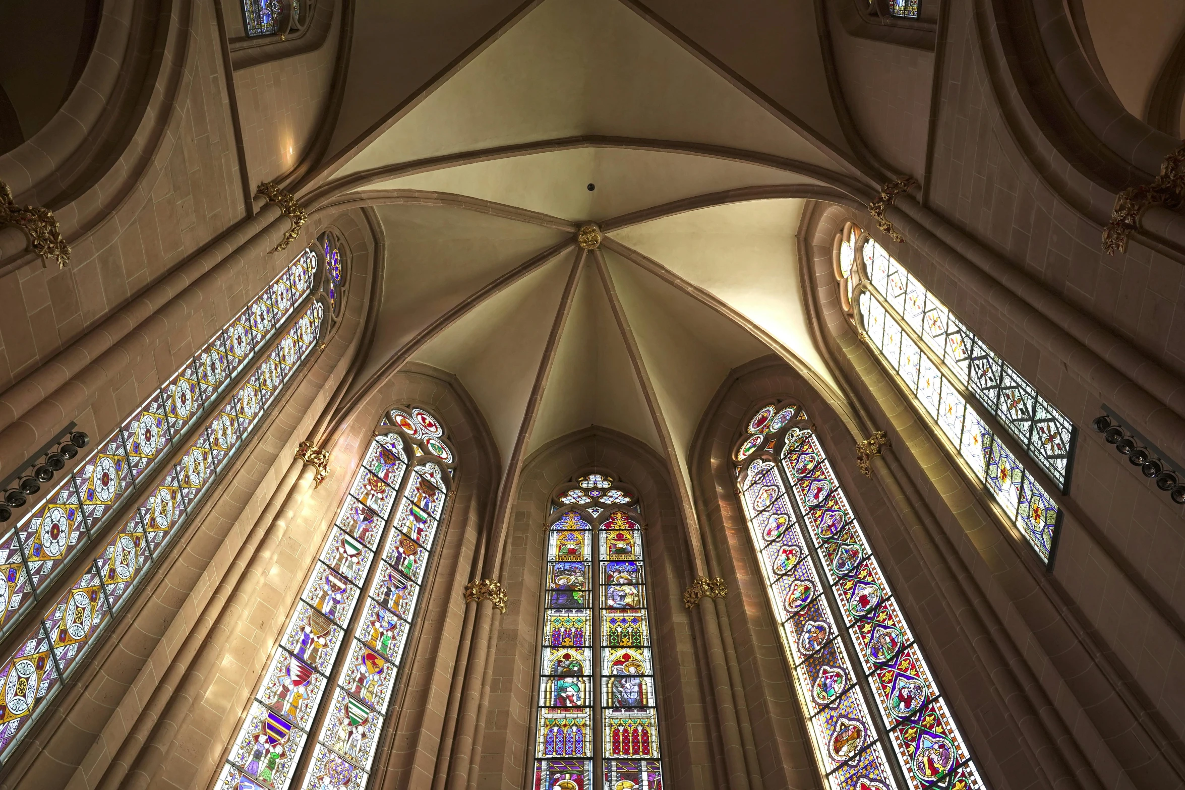 a view of the beautiful stained glass windows in a cathedral