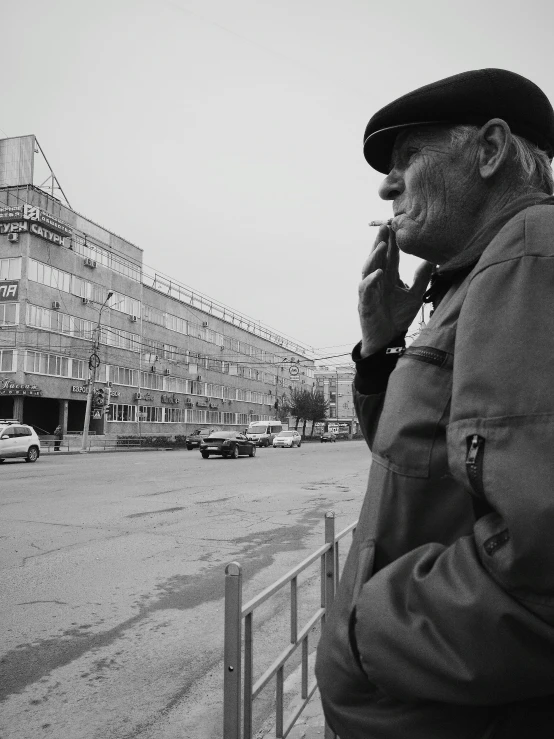 the man is standing in front of an old building