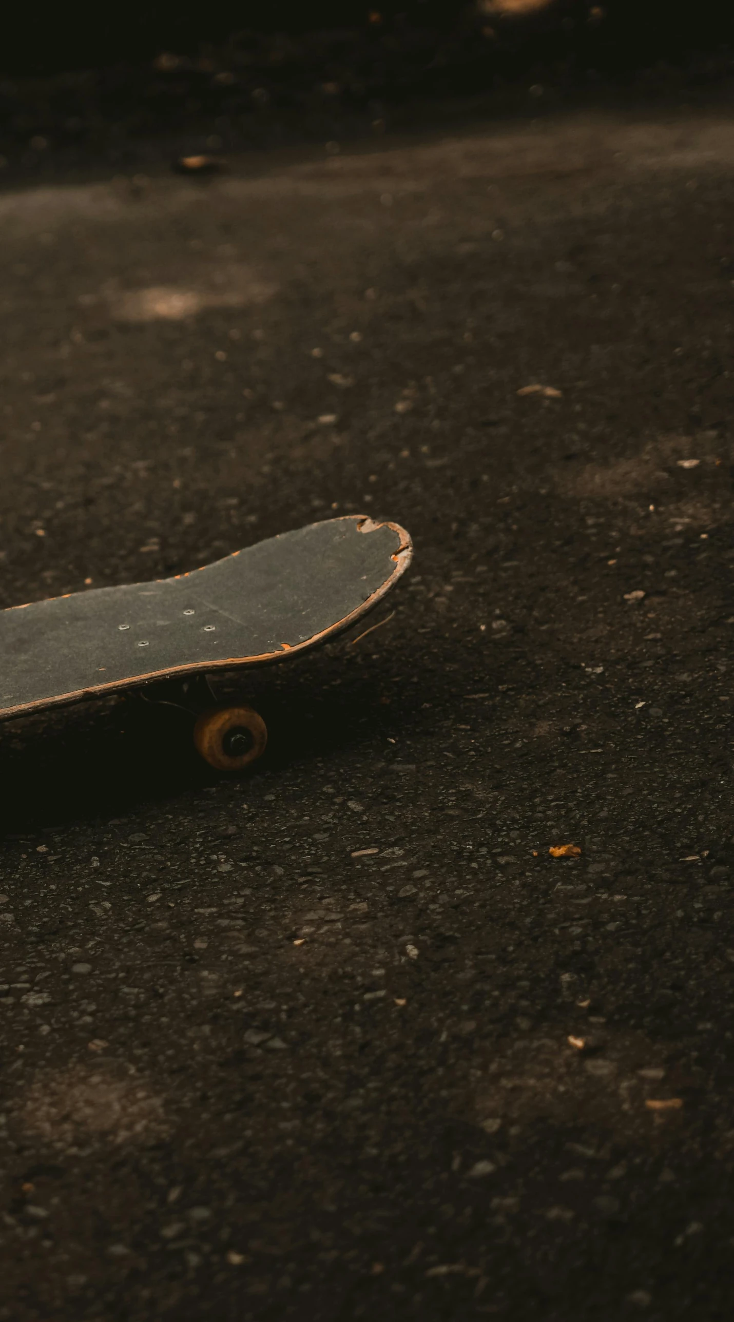 a small skateboard that is sitting on the ground