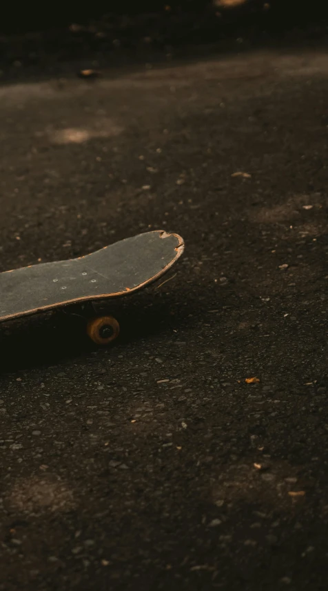 a small skateboard that is sitting on the ground