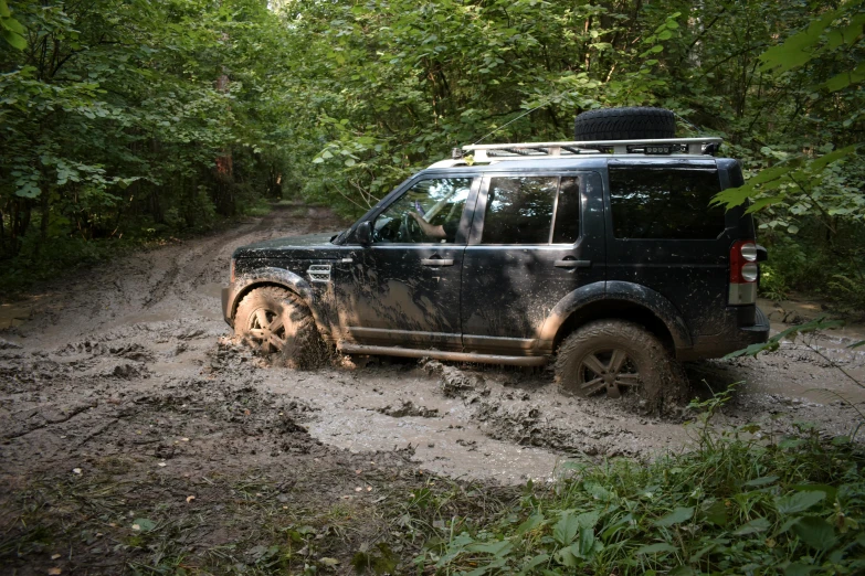 the vehicle is traveling on the muddy road