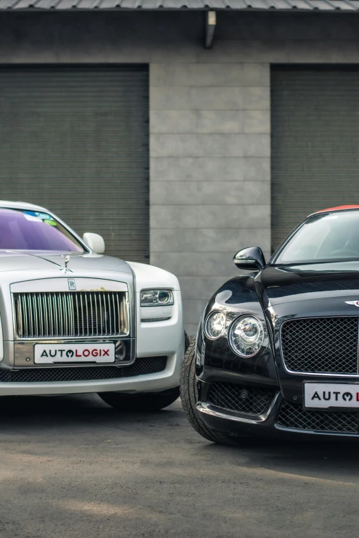 an image of two cars parked next to each other