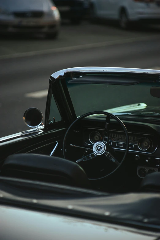 this po shows a dashboard and dashboard mirror on a classic car