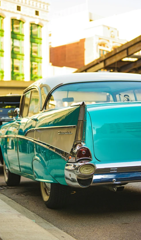 an old car with some shiny paint on it