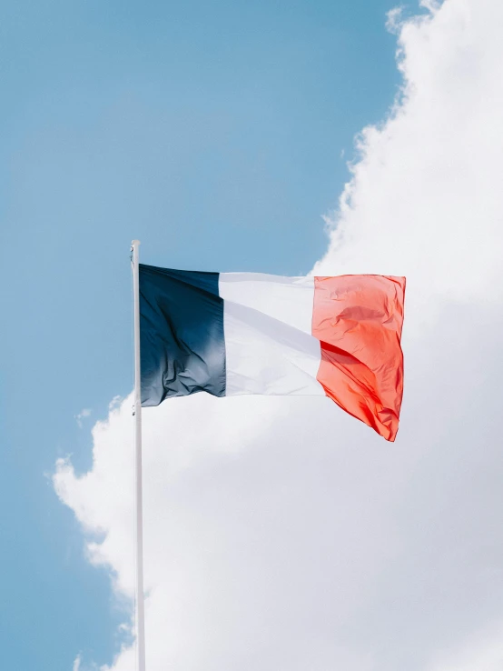 a large flag with a sky background