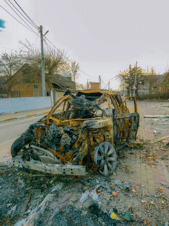 an overloaded car parked at an intersection