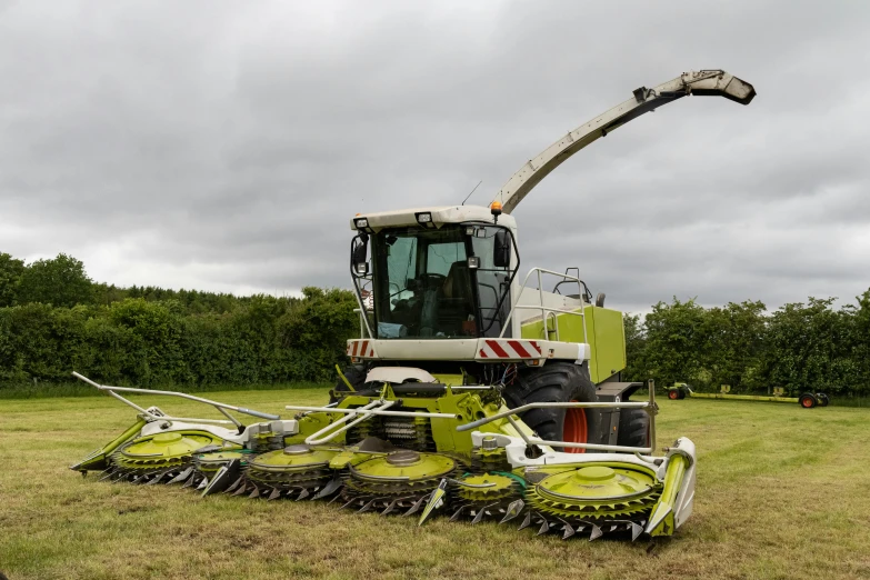 a tractor has it's load lifted from the ground